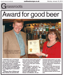 Presentation of a certificate to the St Julian Inn for 20 years in the National Good Beer Guide - Click here to bring up a larger version of this article